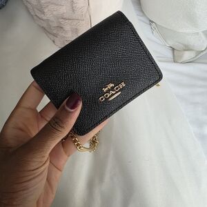 Coach Black Mini Bag with Gold Accents